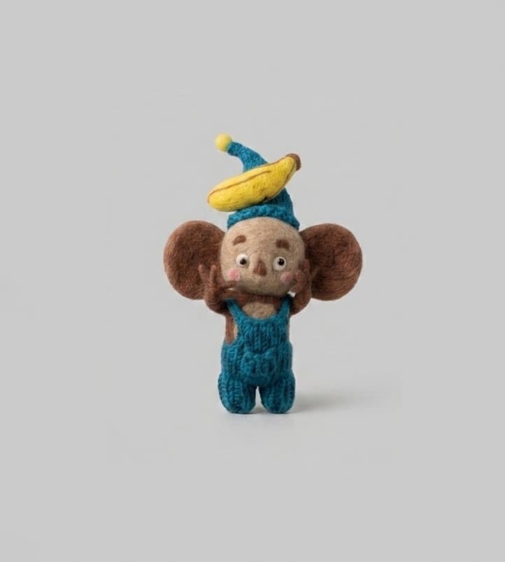 Monkey Doll with Banana Hat - Handmade Felt Product from Nepal